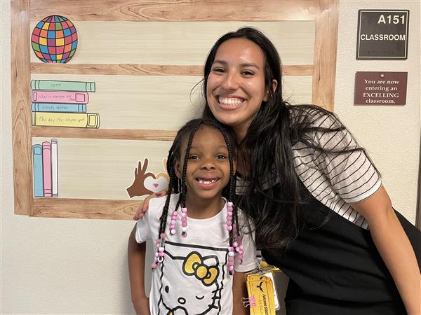 Teacher with student